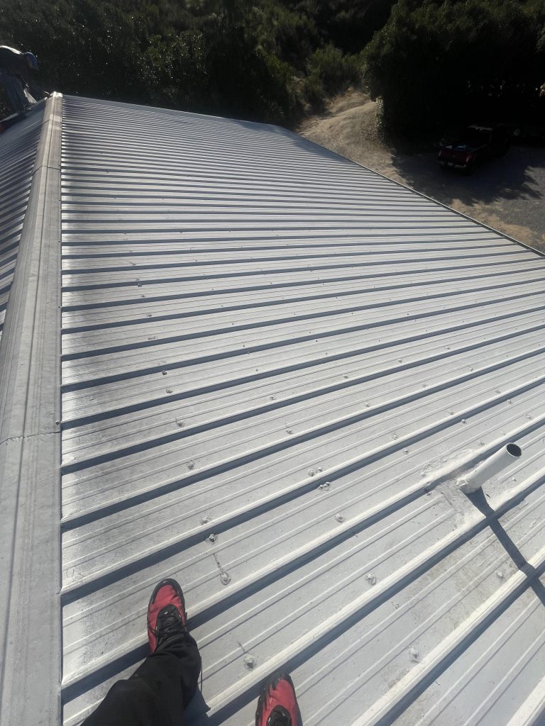Completed metal roof coating project in San Diego County by Luna Roofing