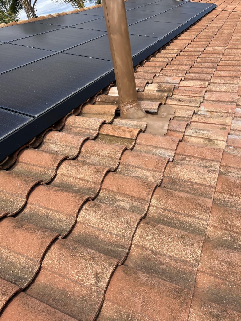 Tile roof repair and flashing replacement near solar panels in San Diego CA by Luna Roofing